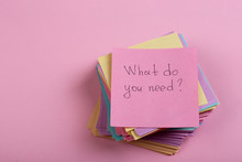 Help And Advice Concept - Sticky Note With Text What Do You Need