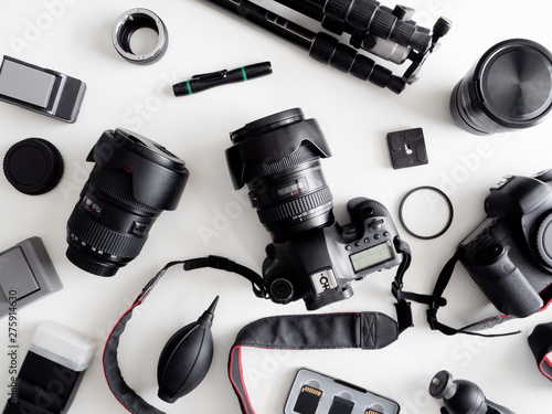 top view of work space photographer with digital camera, flash, cleaning kit, me Tableau sur Toile