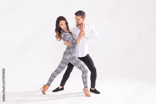 Fotomural Social dance concept - Active happy adults dancing bachata or salsa together ove