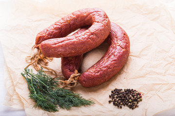 Food, national cuisine and delicious concept - sausages made with horse meat