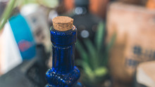 Blue Glass Bottle With Wooden Cork