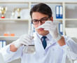 © Elnur - Young researcher scientist doing a water test contamination expe