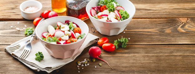 Wall Mural - Salad with cherry tomatoes, radsh and mozzarella, lettuce mix