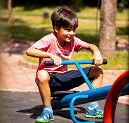 Young boy in seesaw