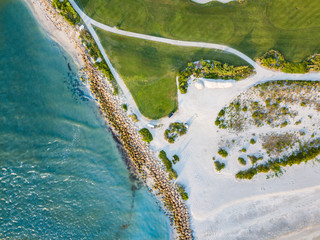 Wall Mural - sand rock water grass