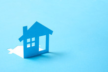 Concept Of House In Paper On Blue Color Background For Real Estate Property Industry