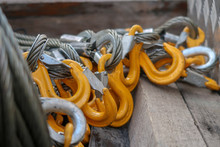 Yellow Grade 80 Sling Hooks Attached To Eye On Wire Rope Slings