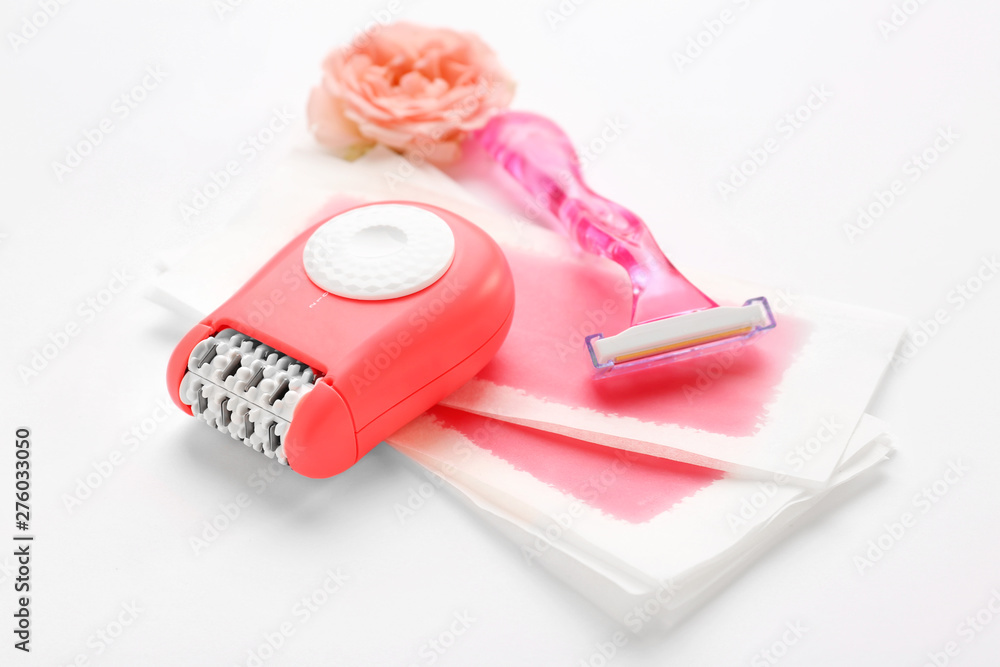 Set for hair removal on white background