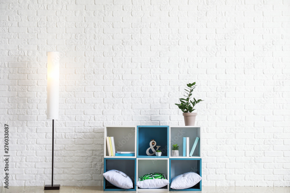 Interior of room with white brick wall