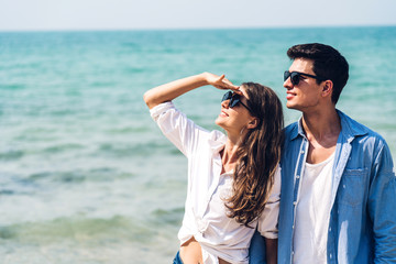 Romantic lovers young couple relaxing together on the tropical beach.Summer vacations