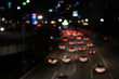 © nunawwoofy - Bokeh blur of traffic lights in city at night