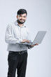 © Niks Ads - Young Indian / Asian man showing laptop screen