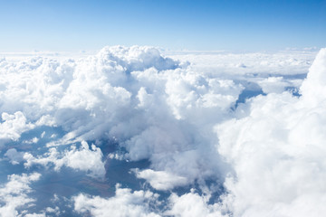 Wall Mural - clouds and sky from airplane window view