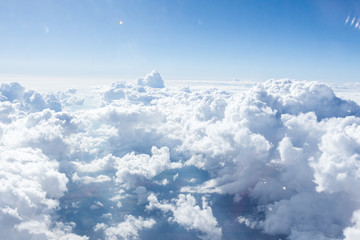 Wall Mural - clouds and sky from airplane window view