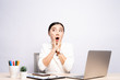 © chajamp - Portrait of a excited woman sitting at office isolated over background