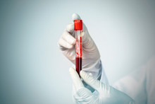 Doctor Hand Holding Blood Collection Tubes In Hematology Laboratory, Medicine And Science Concept