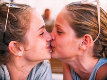 Sisters Kissing