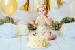 © kaloriya - Little baby girl eating cake on her first birthday cakesmash party