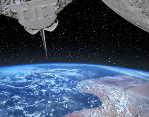 shuttle, earth and planet with craters like moon. the elements of this image furnished by nasa.