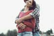 © StockPhotoPro - Happy young couple hugging and smiling