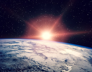 Wall Mural - Sunflare and the earth from space. The elements of this image furnished by NASA.