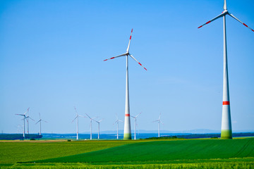 Wind turbines on sunny morning in ba