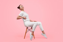 Relaxed Teen Girl Sitting On Chair