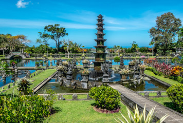 Tirta Gangga, Water Palace with fountain and natural pond. Travel and architecture background. Indonesia, Bali island.