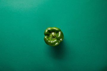 top view of green fresh vegetables on green background