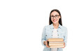 © LIGHTFIELD STUDIOS - smiling brunette girl in glasses in denim jacket holding books isolated on white
