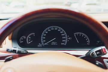 Wall Mural - Luxury car interior details. Dashboard and steering wheel.