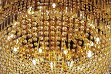 Abstract Luminous Golden Crystal Chandelier Background