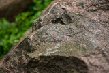 Fototapeta  - old stone boulder wall granite