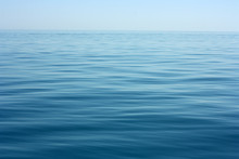 Abstract Calm Sea Or Ocean Water Surface Background