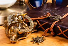 An Antique Brass Nautical Compass And Sundial.