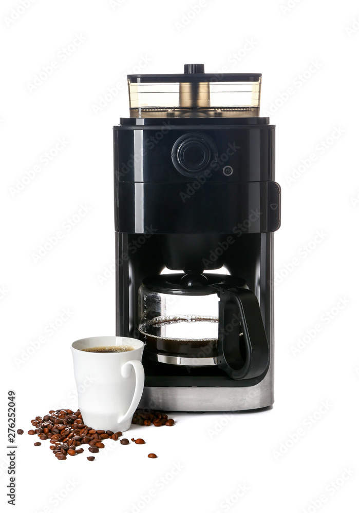 Modern coffee machine with cup on white background