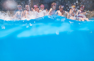 Children play in  pool at the resort