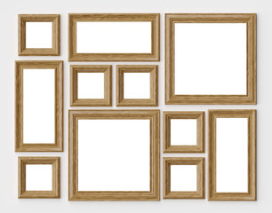 Wall Mural - Wood photo or picture frames on white wall with shadows with cop