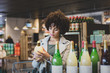 © ReeldealHD images - African American female shopping in a grocery store