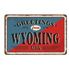 Greetings From Wyoming Vintage Rusty Metal Sign On A White Background, Vector Illustration