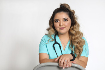 Portrait of a young attractive female Hispanic healthcare professional,  nurse