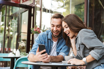 Sticker - Attractive young couple in love having lunch