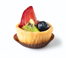 Homemade fruit tart with strawberries kiwi and blueberries isolated on white background