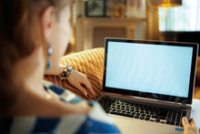 Modern Woman Looking At Laptop Blank Screen