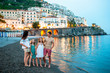 © travnikovstudio - Adorable little girl on sunset in Amalfi town in Italy