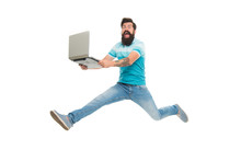 Fast Internet. Technologies Running World. Man Run With Modern Laptop Captured In Motion. Never Stop. Hipster Surprised Bearded Web Developer Designer Or Programmer With Laptop. Modern Laptop Concept