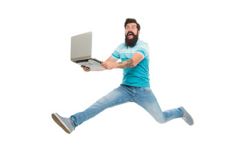 Fast internet. Technologies running world. Man run with modern laptop captured in motion. Never stop. Hipster surprised bearded web developer designer or programmer with laptop. Modern laptop concept