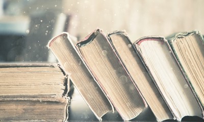 Poster - Close up of Rows of old books on the table