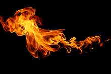 Movement Of Fire Flames Isolated On Black Background.