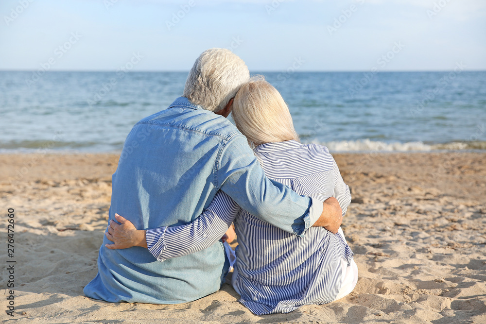 Happy mature couple at sea resort